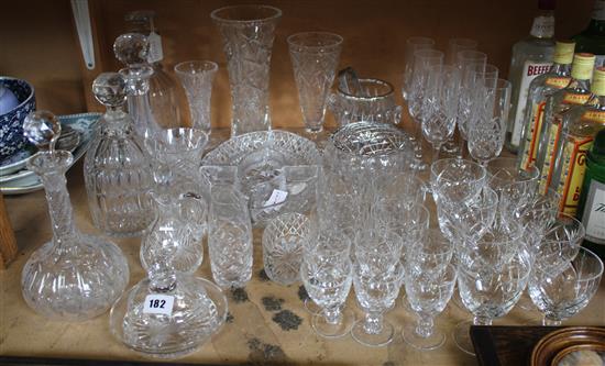Three cut glass decanters, various vases, table glasses etc